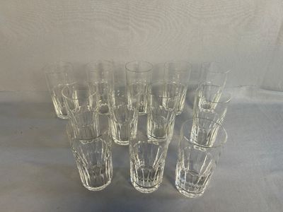 a lot of glasses that are sitting on a table