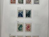 an image of a picture of a collection of stamps on a table