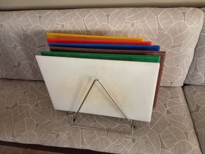 a picture of a stack of colored folders on a couch