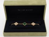 a pair of bracelets in a box with a black velvet lining