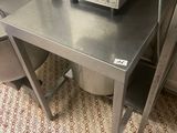 a machine that is sitting on a table in a kitchen