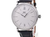a close up of a wrist watch with roman numerals on it