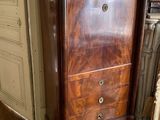 an image of a dresser in a room with wood floors