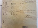 a receipt with a picture of a man on it