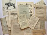 a pile of old papers that are on a table
