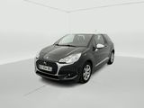 a black car in a white room with a white floor