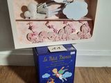 une boîte sur laquelle est représenté un petit prince