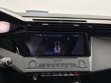 the dashboard of a car with a digital display in the center