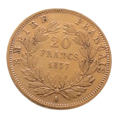 l'image d'une pièce d'or ornée d'une couronne sur l'avers