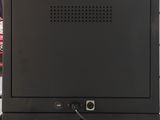 an image of a black metal cabinet in a kitchen
