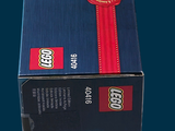 a blue box with a red ribbon on top of it
