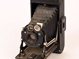 an old camera that is sitting on a table
