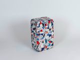 an image of a white and blue box with red, white, and blue designs