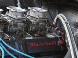 an image of a close up of a car engine with hoses