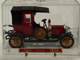 a small model of an old car in a clear box
