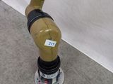 a picture of a robot that is standing on a metal base