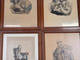 several framed pictures of people sitting on a couch in front of a wall