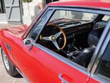 a red car that has a steering wheel and a steering wheel on it