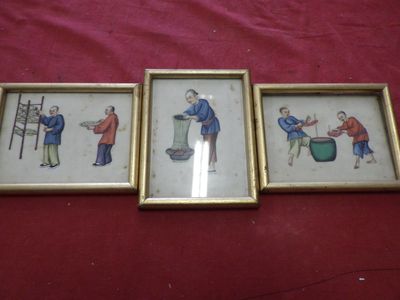 three framed pictures of people in various poses on a red surface