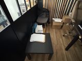 a room with a desk and a chair in it
