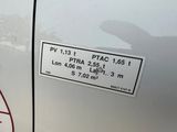 a sticker on the side of a car that has a sticker on it