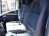 the interior of a van with black leather seats and black leather trims