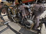 a close up view of a motorcycle engine on display