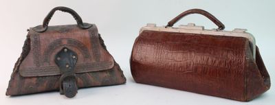 pair of brown leather purses on white background