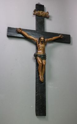 a wooden cross with a crucifix on it