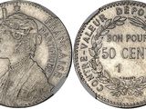 une pièce d'argent sur laquelle figure le portrait d'une femme