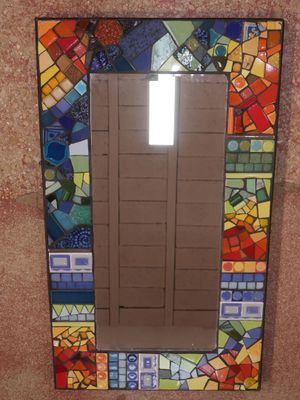 a picture of a mirror that is made out of glass