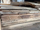 many pieces of wood stacked on top of each other
