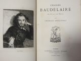 an old book with a picture of a man smoking a cigarette