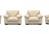 three chairs and a couch in a row on a white background