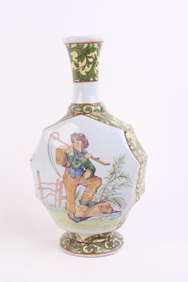 a vase with a picture of a man on it