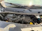 a car engine with the hood open and the hood down