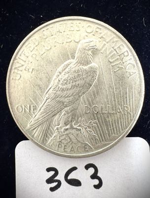 une image représentant une pièce de monnaie sur laquelle figure un oiseau