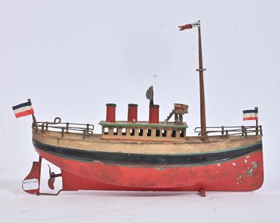 une maquette rouge et noire d'un bateau dans la neige