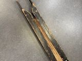 a pair of tongs that are on a table