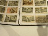 un livre ouvert sur lequel figurent des photos de bâtiments anciens