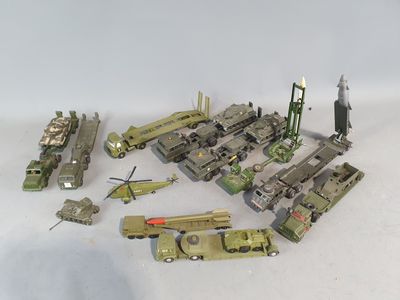 a lot of military toys that are on a white surface