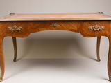 an image of a small desk with two drawers and a gold top
