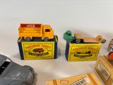several toy cars are lined up next to each other on a table