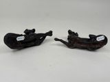 pair of antique cast iron dog sled figurines