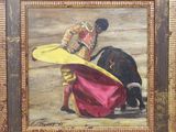 une peinture à l'huile représentant un taureau et un torero avec une cape rouge