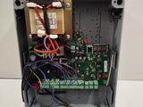 a close up of an electronic device with wires and wires in it