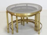 an image of a glass and brass coffee table with a glass top