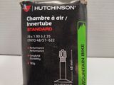 a close up of a box of cigarettes on a white surface