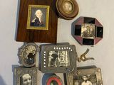 a lot of antique items on a white table