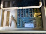 a box with a keyboard and a mouse in it